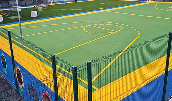 image of a safe sports play area with SchoolsGrass