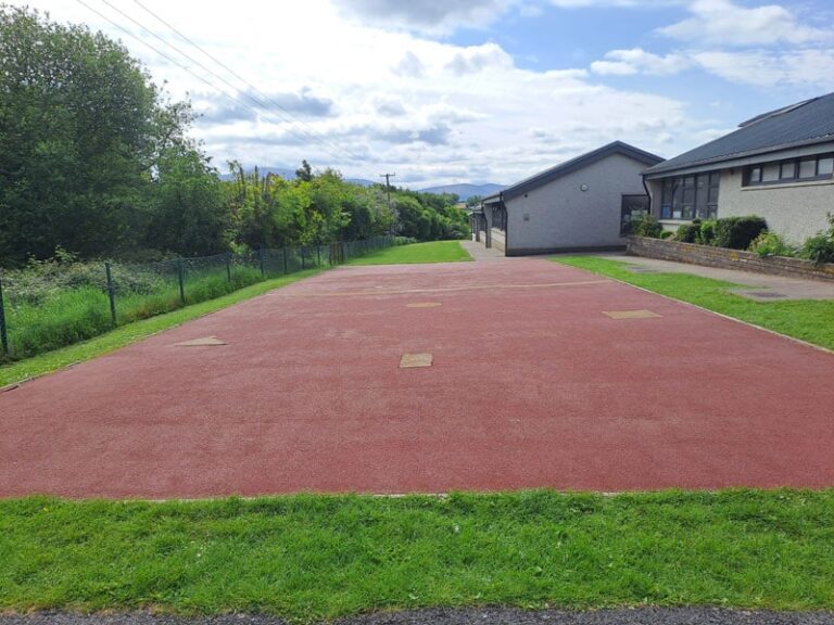 image of play area in Special Needs school before artificial grass