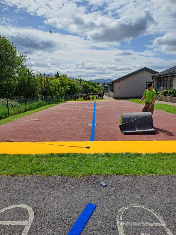 image of play area in Special Needs school - installation of artificial grass