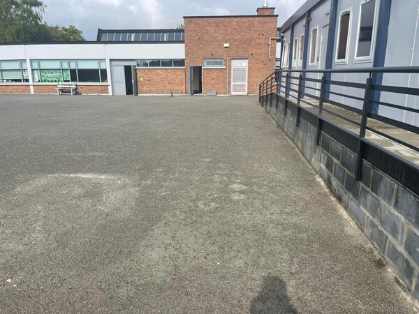 image of school playground before installation with artificial grass
