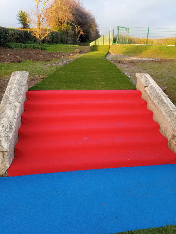 image of school playground steps with artificial grass