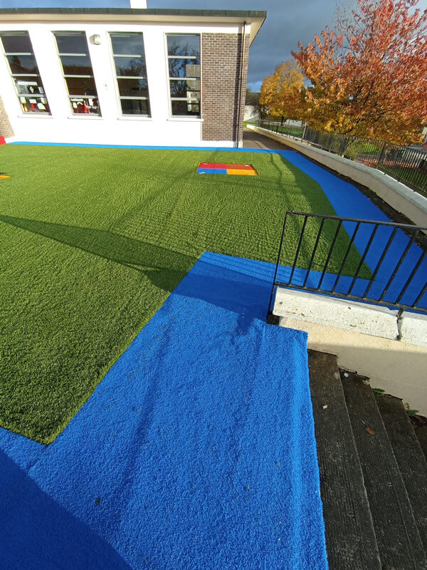 image of school playground with artificial grass